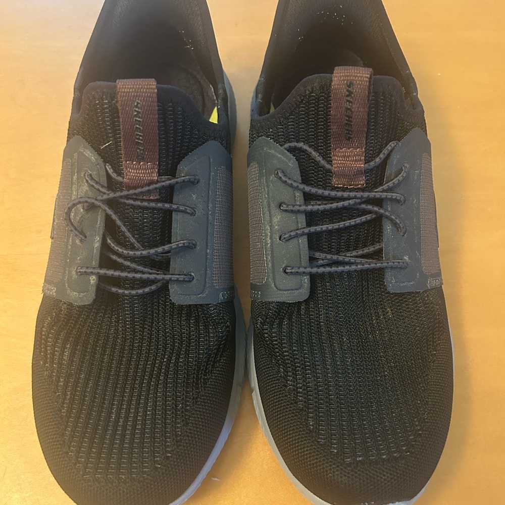 Skechers Black Slip-Ons with Gray Accents